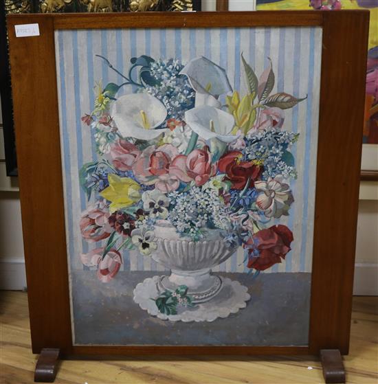 A firescreen, mounted with an oil on canvas still life of flowers mounted as